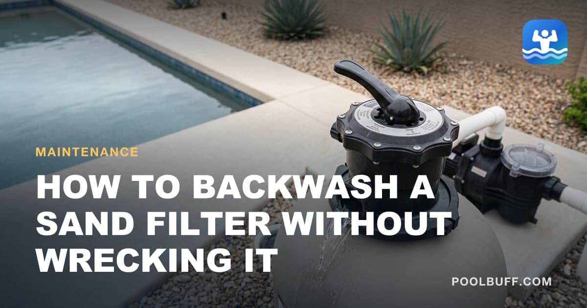 A multiport valve head filling the frame on top of a sand filter, its lever pressed down and rotated to one side