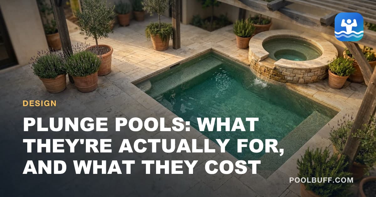 A small rectangular plunge pool set into a compact paved courtyard, a full-width bench seat visible underwater along one end
