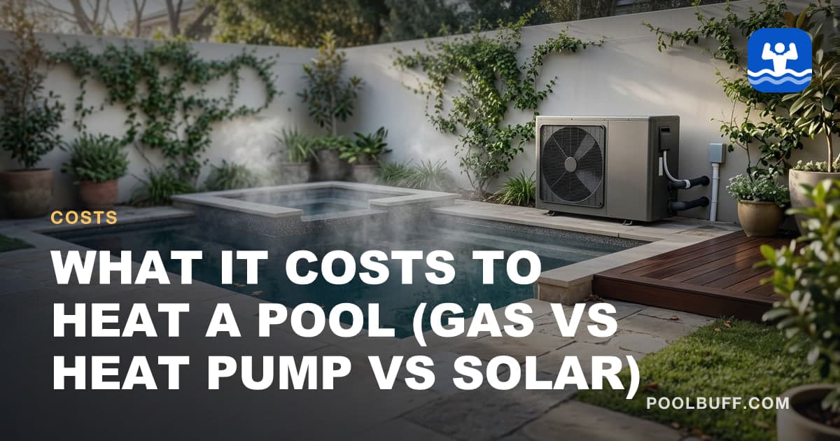 A pool heat pump beside a pool with steam rising off the water in cool air